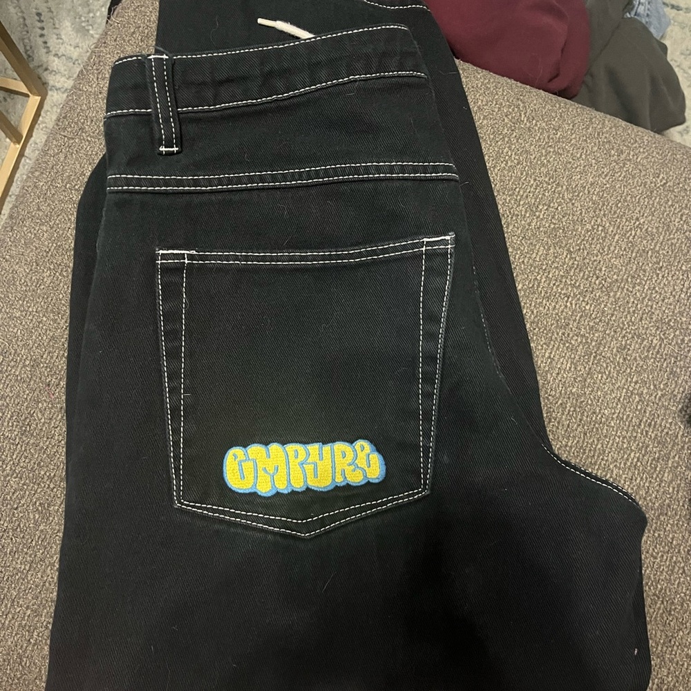 Black Jeans with Yellow and Blue Logo